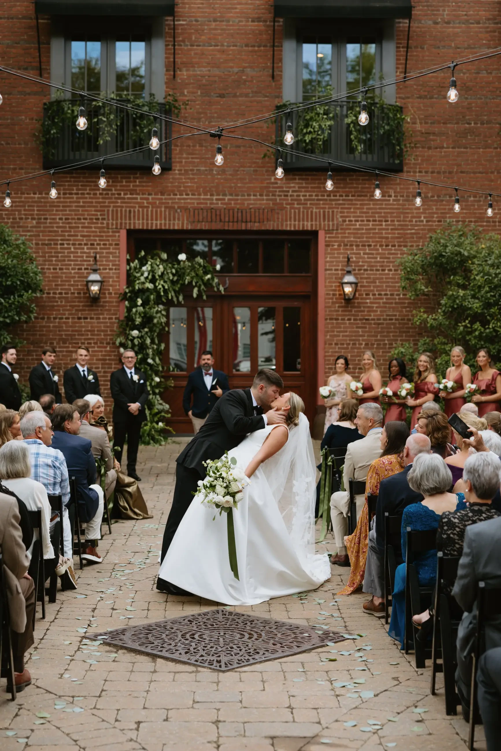 image shows sydney and jackson kissing on their wedding day